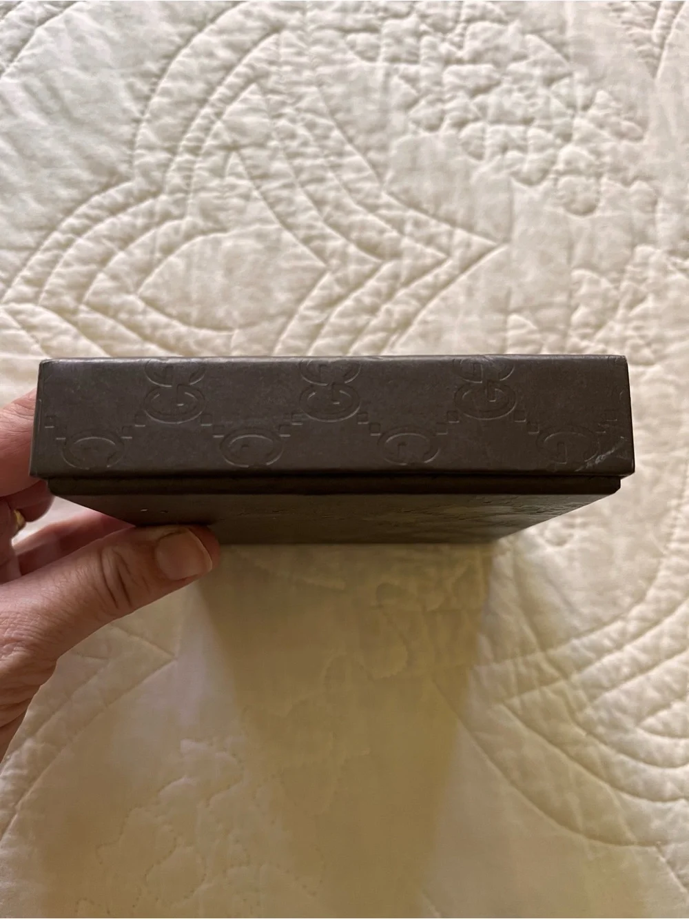 Gucci embossed pattern